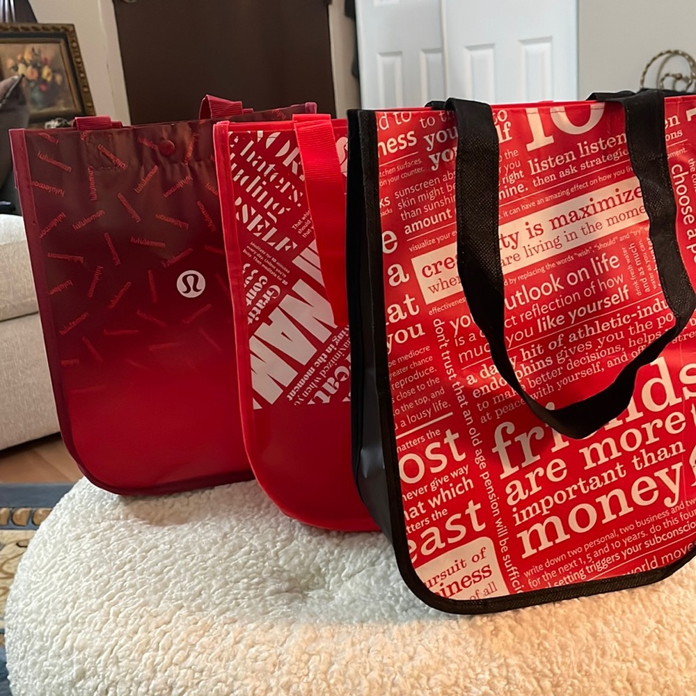 A bundle of 3 small tote bags